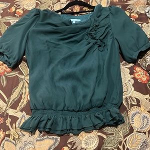 Green silk blouse